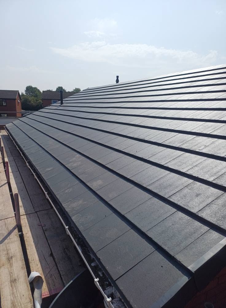 Newly tiled pitched roof completed by NPS by Northern Plastic Solutions